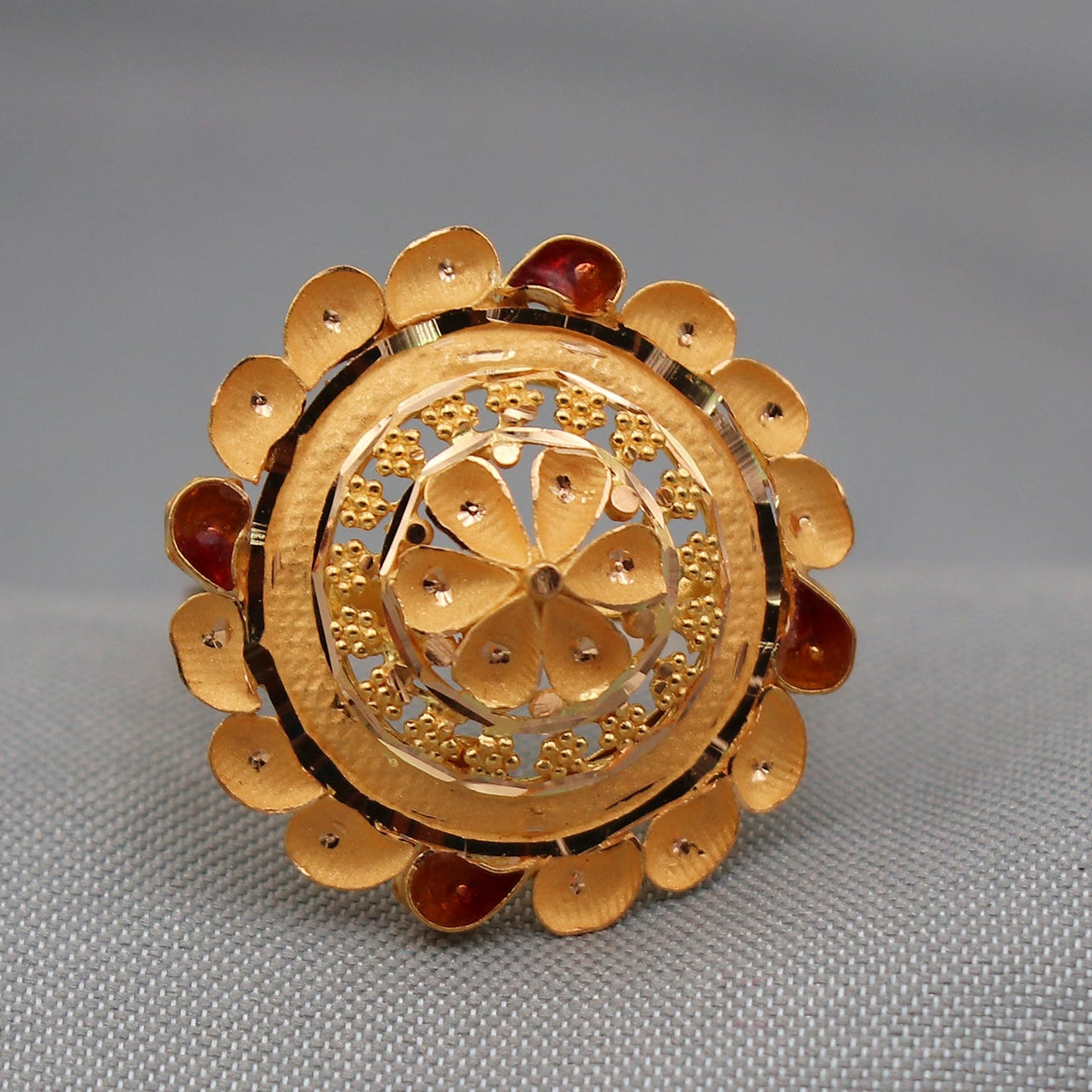 Gold ring with intricate design 