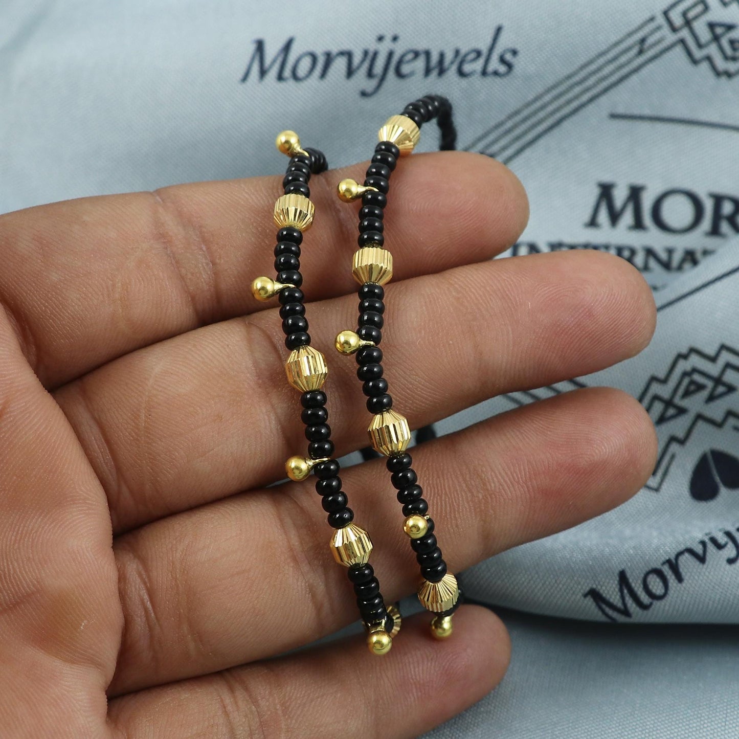 22k gold beads Handmade Black and Gold Beaded Adjustable Bracelet (pair)